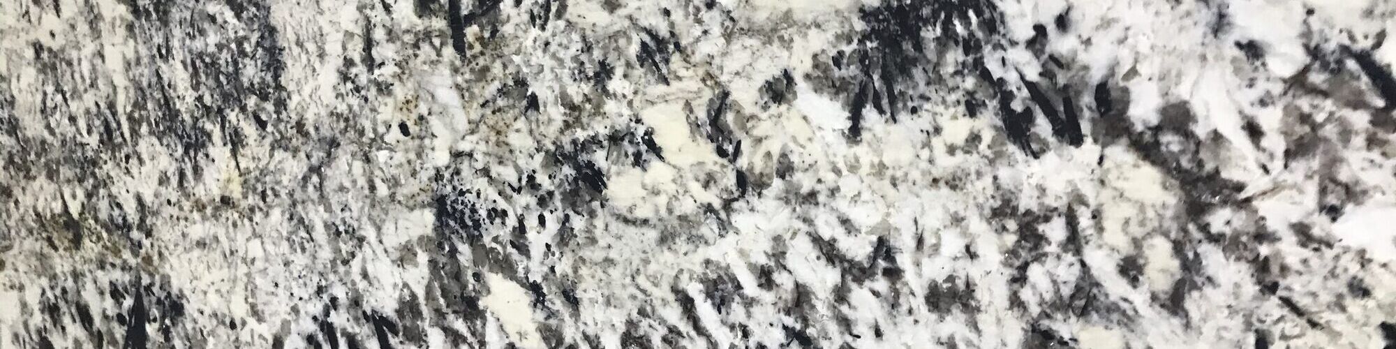 A granite slab with strong grey and white movement