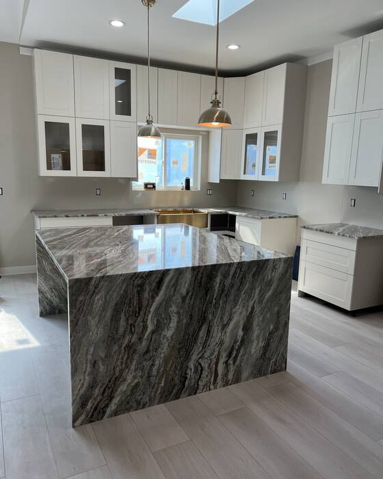 Finished kitchen countertop and island, fabricated by Beautiful Granite & Marble