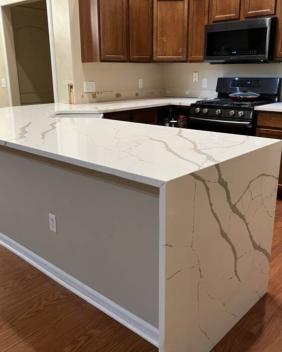 Finished kitchen countertop and island, fabricated by Beautiful Granite & Marble