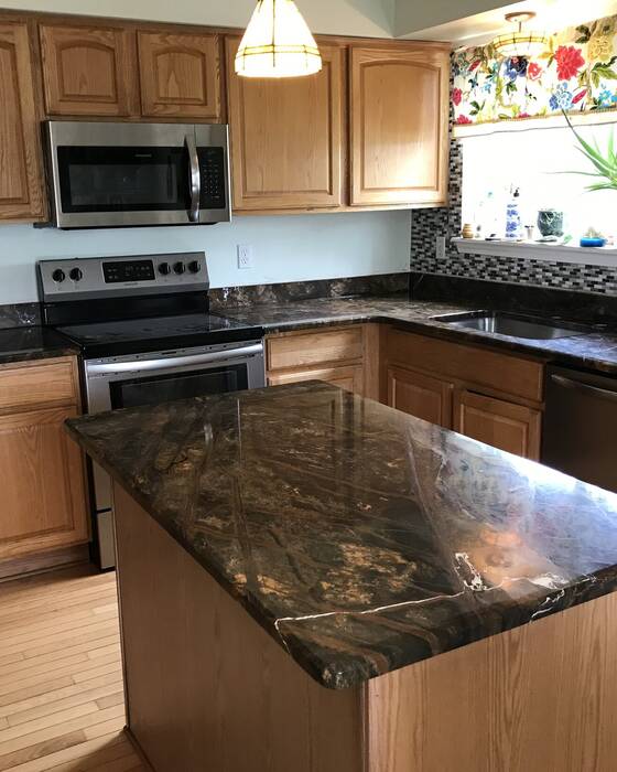 Finished kitchen countertop and island, fabricated by Beautiful Granite & Marble