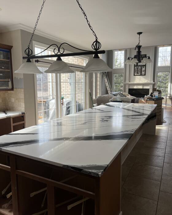 Finished kitchen countertop and island, fabricated by Beautiful Granite & Marble