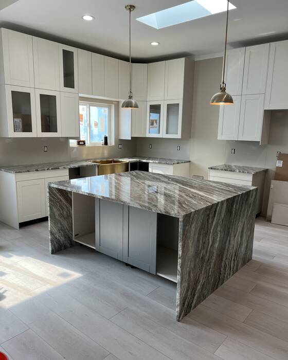 Finished kitchen countertop and island, fabricated by Beautiful Granite & Marble