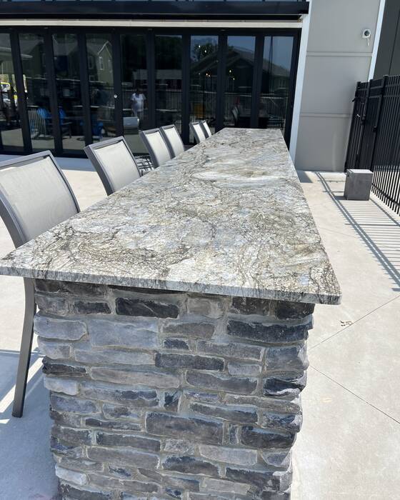 Finished kitchen countertop and island, fabricated by Beautiful Granite & Marble