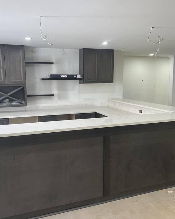 Finished kitchen countertop and island, fabricated by Beautiful Granite & Marble