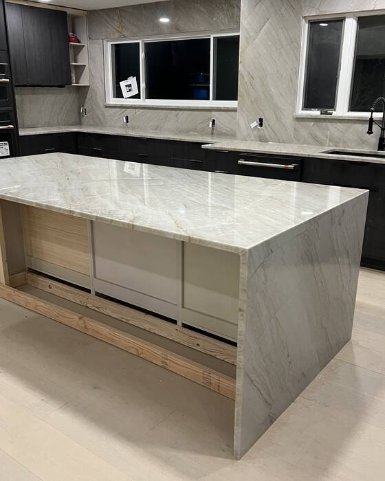 Finished kitchen countertop and island, fabricated by Beautiful Granite & Marble